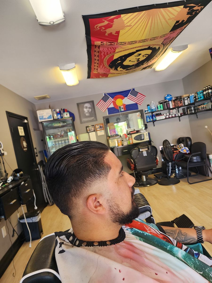 A finished low fade with a clean neckline