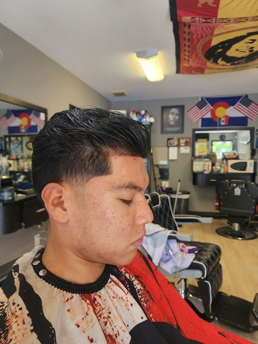A finished cut and beard line-up at Champ's